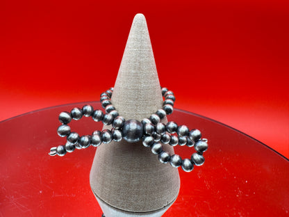 Sterling Silver Pearl Bow Ring
Summer Vibes Drop - West Spork Mercantile