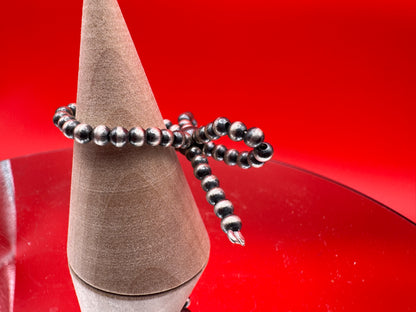 Sterling Silver Pearl Bow Ring
Summer Vibes Drop - West Spork Mercantile