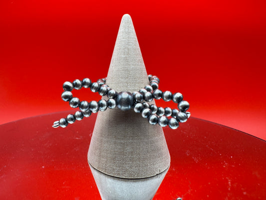 Sterling Silver Pearl Bow Ring
Summer Vibes Drop - West Spork Mercantile