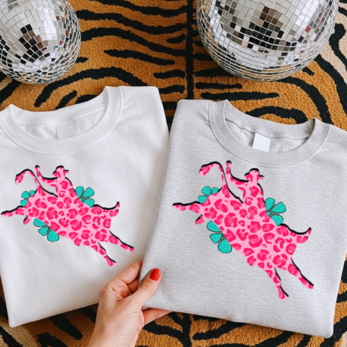 The pink cheetah turquoise bullrider sublimation T-shirt